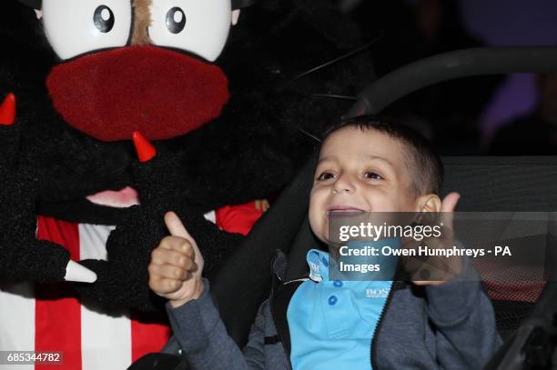 Terminally ill football mascot Bradley Lowery celebrates his sixth birthday at Blackhall Cricket Club near Durham.