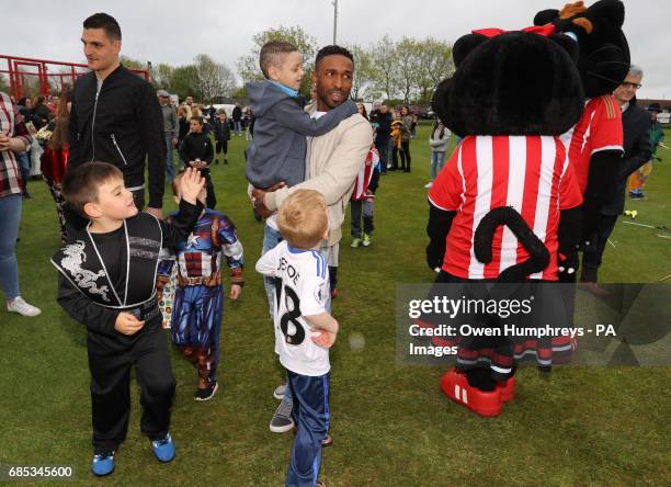 Sunderland footballers Jermain Defoe and Vito Mannone with terminally ill football mascot Bradley Lowery, as he celebrates his sixth birthday at...