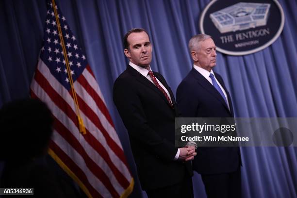 Secretary of Defense Jim Mattis and Special Presidential Envoy for the Global Coalition to Counter ISIS Brett McGurk listen to questions from...