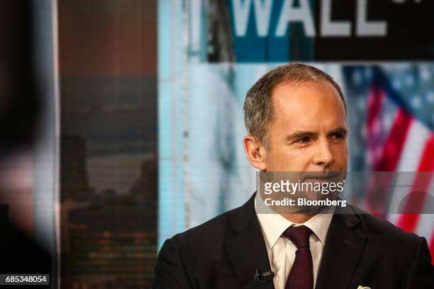Mark Connors, global head of risk advisory at Credit Suisse Securities LLC, listens during a Bloomberg Television interview in New York, U.S., on...