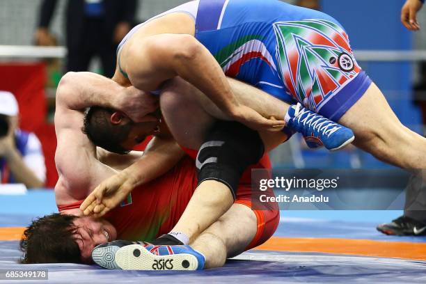 Gadzihiyev Nurmagomed of Azerbaijan and Mohammadi Amir of Iran compete in the Men's Freestyle Wrestling 97kg Gold Medal during day eight of Baku 2017...