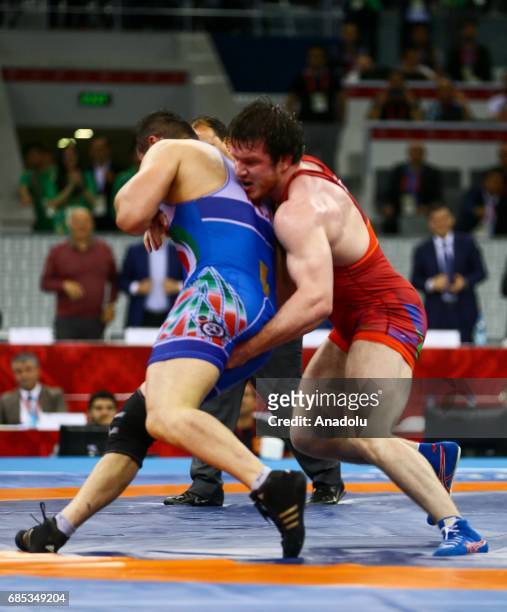Gadzihiyev Nurmagomed of Azerbaijan and Mohammadi Amir of Iran compete in the Men's Freestyle Wrestling 97kg Gold Medal during day eight of Baku 2017...