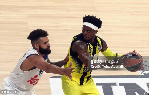 Bobby Dixon, #35 of Fenerbahce Istanbul competes with Jeffery Taylor, #44 of Real Madrid during the Turkish Airlines EuroLeague Final Four Semifinal...