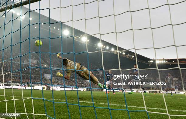 Strasbourg's Kader Mangane shoots to score a goal during the French L2 football match between Strasbourg and Bourg-en-Bresse at the Meinau stadium on...