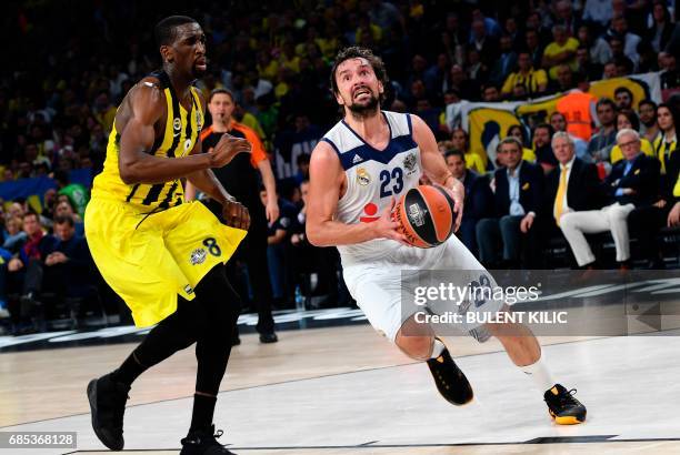 Fenerbahce's Ekpe Udoh tries to stop Real Madrid's Sergio Llull during the semi-final basketball match between Fenerbahce Ulker vs Real Madrid at the...