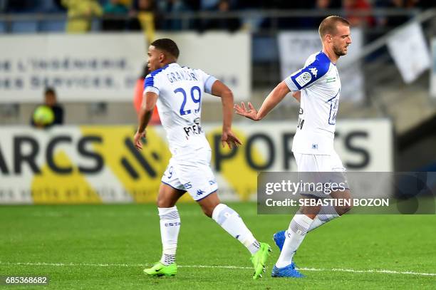 Troyes' French midfielder Stephane Darbion celebrates after scoring a goal during the French L2 football match Sochaux versus Troyes on May 19, 2017...