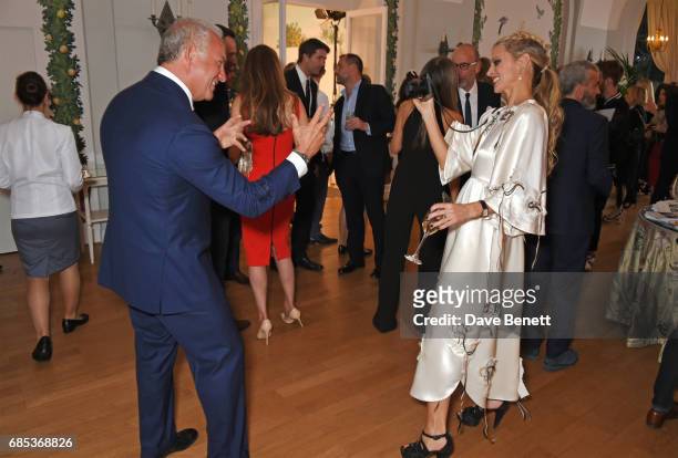 Charles Finch and Laura Bailey attend The 9th Annual Filmmakers Dinner hosted by Charles Finch and Jaeger-LeCoultre at Hotel du Cap-Eden-Roc on May...