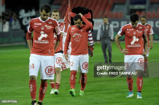 Brest's players react after the French Ligue 2 football match Brest against GFC Ajaccio on May 19, 2017 at the Francis Le Blé stadium in Brest,...