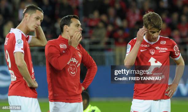 Brest's players react after the French Ligue 2 football match Brest against GFC Ajaccio on May 19, 2017 at the Francis Le Blé stadium in Brest,...