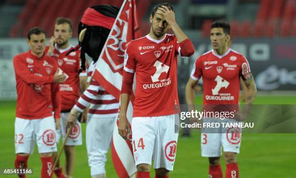 Brest's players reacts after the French Ligue 2 football match Brest against GFC Ajaccio on May 19, 2017 at the Francis Le Blé stadium in Brest,...