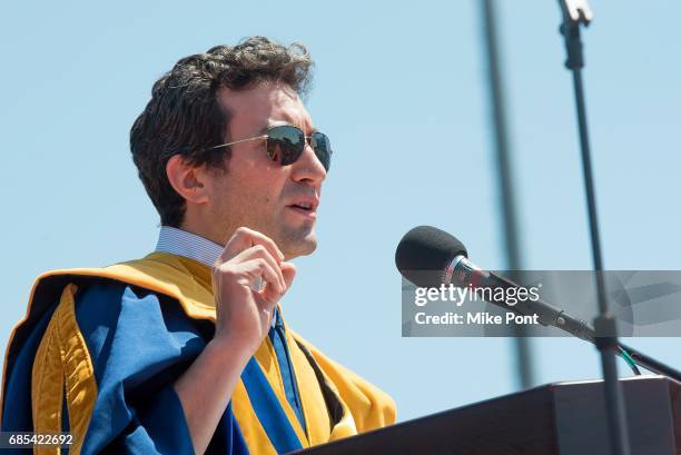 Founder and CEO of Shutterstock Jon Oringer receives an honorary degree of Doctor of Science during the Stony Brook University 2017 Commencement at...