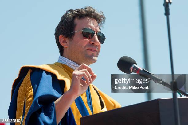 Founder and CEO of Shutterstock Jon Oringer receives an honorary degree of Doctor of Science during the Stony Brook University 2017 Commencement at...