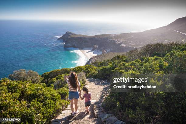 mother and daugher at cape point enjoying the view - south africa family stock pictures, royalty-free photos & images