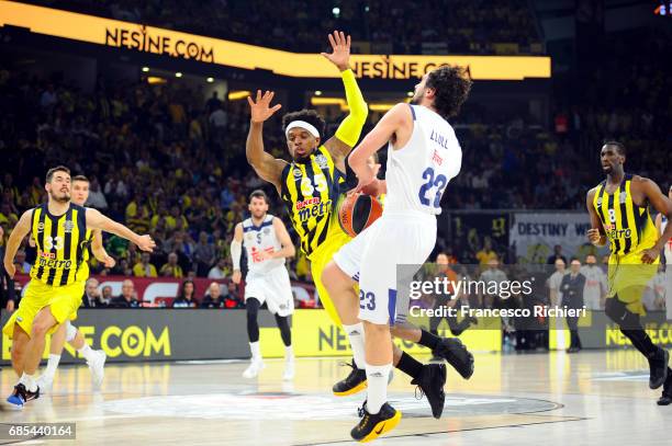 Sergio Llull, #23 of Real Madrid competes with Bobby Dixon, #35 of Fenerbahce Istanbul during the Turkish Airlines EuroLeague Final Four Semifinal A...