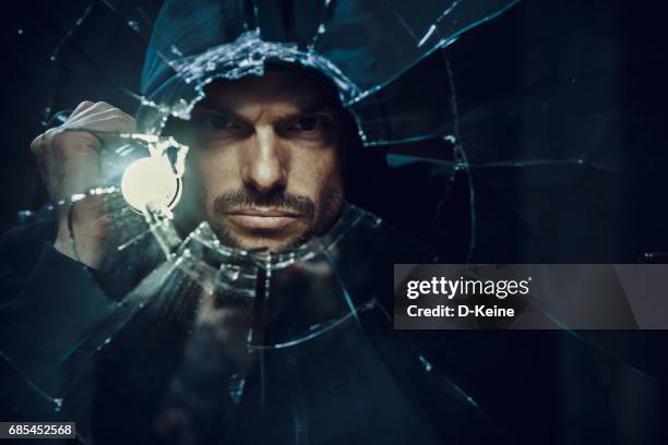 einbrecher - terrorismus stock-fotos und bilder