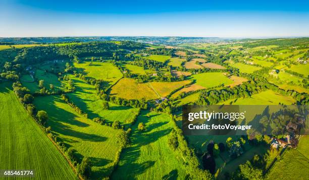 summer fields green patchwork pasture idyllic country farms aerial panorama - gloucester england stock pictures, royalty-free photos & images