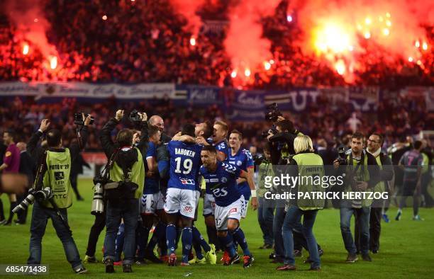 Strasbourg's players celebrate after the French L2 football match between Strasbourg and Bourg-en-Bresse at the Meinau stadium in Strasbourg, eastern...