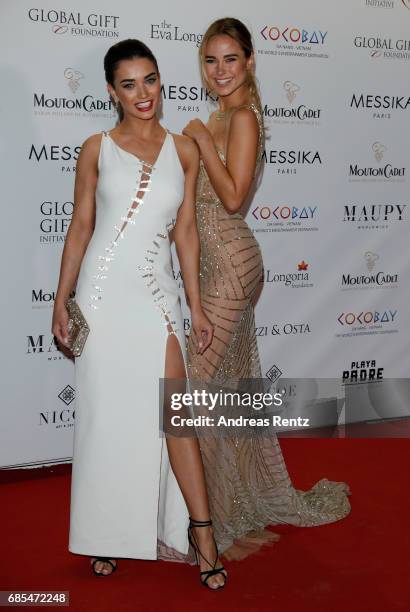 Amy Jackson and Kimberley Garner attend the Eva Longoria Global Gift Gala during the 70th annual Cannes Film Festival at on May 19, 2017 in Cannes,...