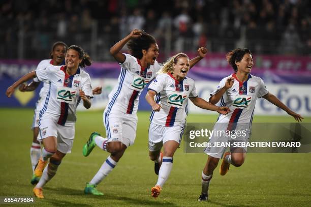 Lyon's players celebrate after scoring a goal during the women's French Cup football finale match between Lyon and Paris on May 19, 2017 at the...