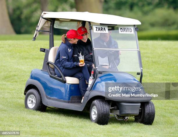 Dolly Maude, Zara Phillips and David Coulthard seen driving a golf buggy as they attend the 5th edition of the 'ISPS Handa Mike Tindall Celebrity...