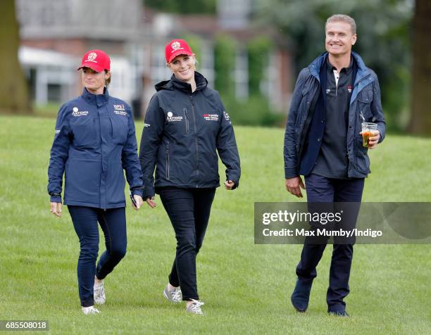 Dolly Maude, Zara Phillips and David Coulthard attend the 5th edition of the 'ISPS Handa Mike Tindall Celebrity Golf Classic' at The Belfry on May...