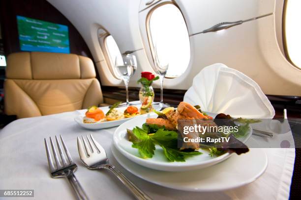 a meal served onboard a business jet. - plane food stock pictures, royalty-free photos & images