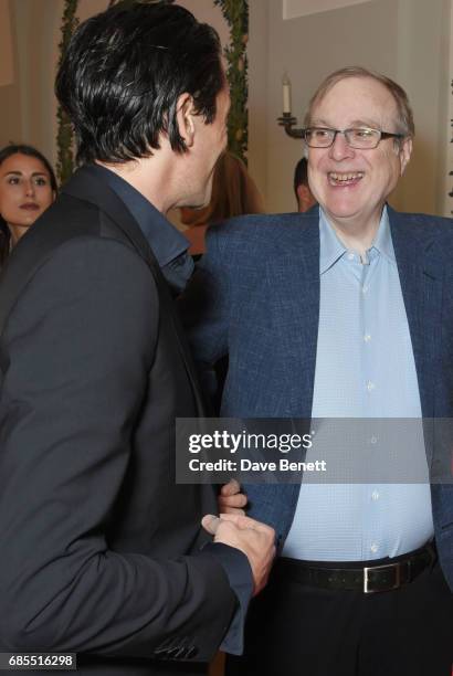 Adrien Brody and Paul Allen attend The 9th Annual Filmmakers Dinner hosted by Charles Finch and Jaeger-LeCoultre at Hotel du Cap-Eden-Roc on May 19,...