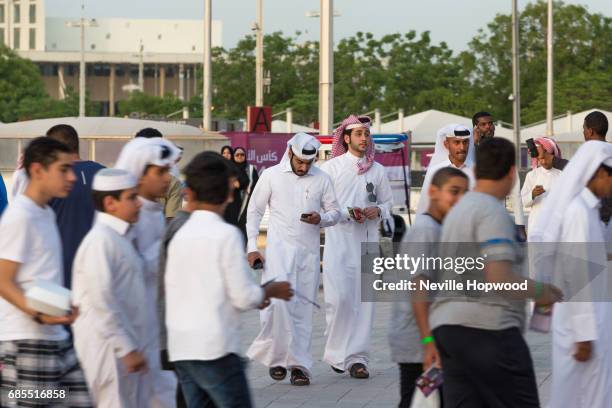 Spectators arrive at the Khalifa International Stadium for the grand opening, at Khalifa International Stadium on May 19, 2017 in Doha, Qatar.