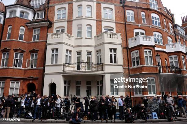 Journalists at the Ecuadorian embassy as people wait for Julian Assange to come out and make a statement, in London, on May 19, 2017.