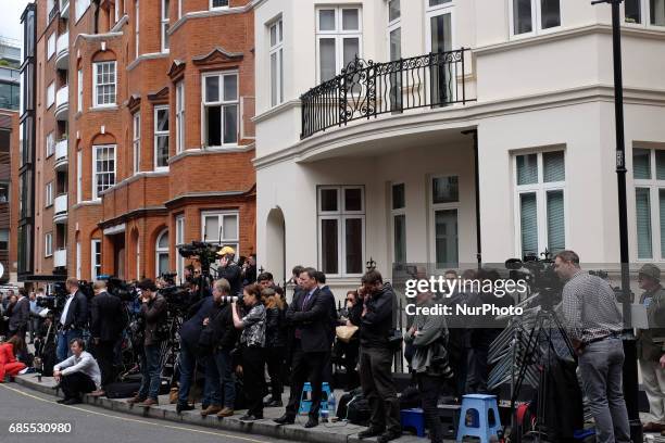 Journalists at the Ecuadorian embassy as people wait for Julian Assange to come out and make a statement, in London, on May 19, 2017.