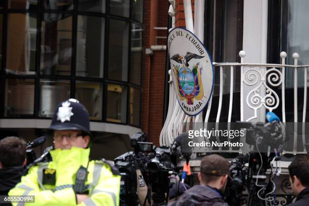 Journalists at the Ecuadorian embassy as people wait for Julian Assange to come out and make a statement, in London, on May 19, 2017.