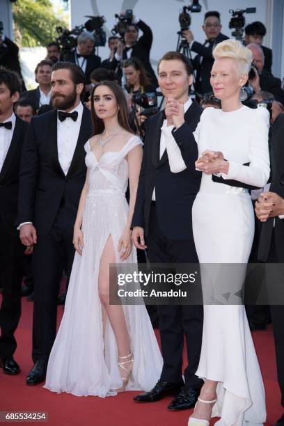 Actors Jake Gyllenhaal, Lily Collins, Paul Dano and Tilda Swinton attend the 'Okja' screening during the 70th annual Cannes Film Festival at Palais...