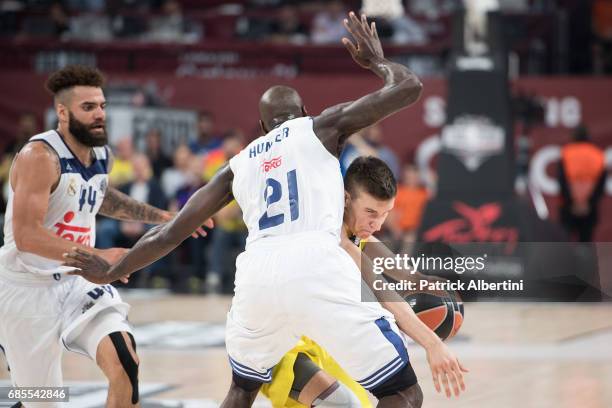 Bogdan Bogdanovic, #13 of Fenerbahce Istanbul competes with Othello Hunter, #21 of Real Madrid during the Turkish Airlines EuroLeague Final Four...