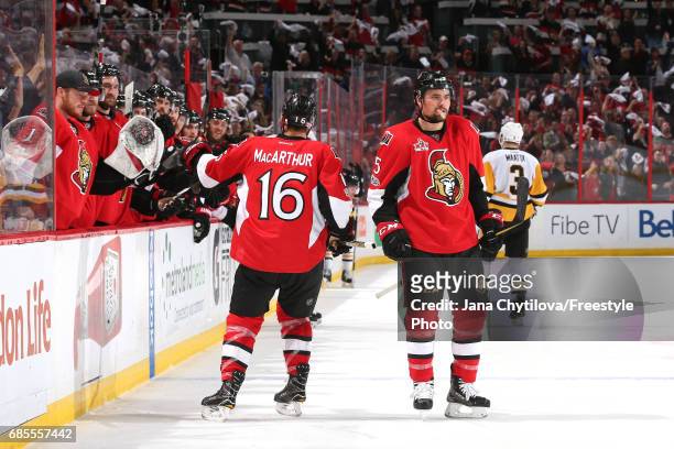 Clarke MacArthur of the Ottawa Senators celebrates with his teammates after scoring a goal against Matt Murray of the Pittsburgh Penguins during the...