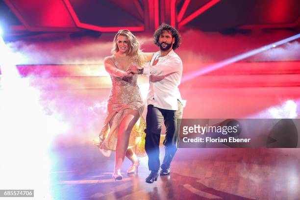 Angelina Kirsch and Massimo Sinato perform on stage during the 9th show of the tenth season of the television competition 'Let's Dance' on May 19,...