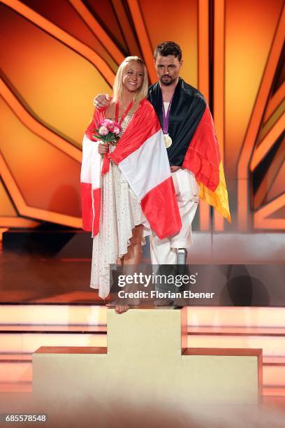 Heinrich Popow and Kathrin Menzinger perform on stage during the 9th show of the tenth season of the television competition 'Let's Dance' on May 19,...