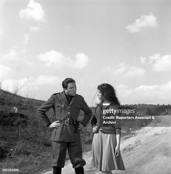 Italian actress Stefania Sandrelli and Italian actor Ugo Tognazzi on the set of the film 'The Fascist'. Italy, 1961