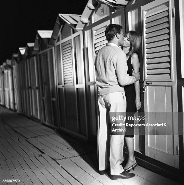 Italian actress Eleonora Rossi Draghi with French actor Jean Louis Trintignant - as Carlo, the son of a fascist hierarch - in a scene from the film...