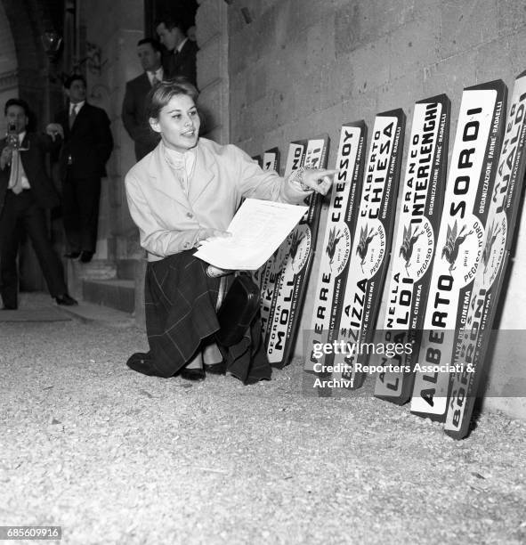 Italian actress Marisa Allasio attending to the III Cinema Rally. Italy, 1956