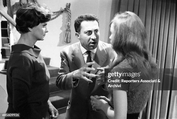 Italian director Leopoldo Trieste giving cues to Italian actress Alida Valli and French actress Marie Versini on the set of Il peccato degli anni...