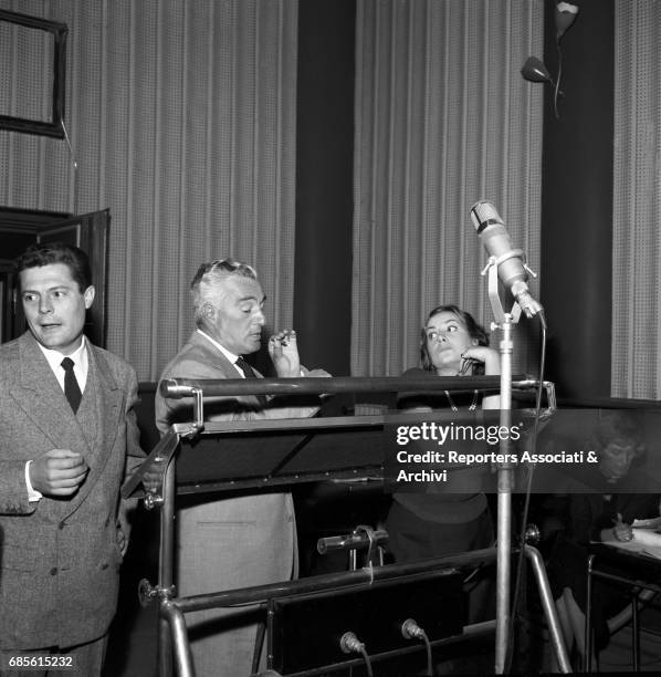 Italian actors Marcello Mastroianni and Vittorio De Sica dubbing the movie Doctor and the Healer. 1st November 1957