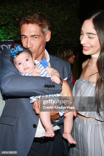 Johnny Lozada poses with his grandaughter Amaia and daughter Natalia Lozada during the launching of the Cap Collection by Johnny Lozada at Verdanza...