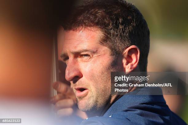 Geelong Coach Shane O'Bree talks to his players during the round six VFL match between the Footscray Bulldogs and the Geelong Cats at Whitten Oval on...