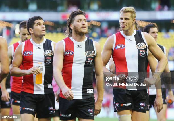 Jack Steven of the Saints Leigh Montagna and Nick Riewoldt looks dejected after defeat during the round nine AFL match between the St Kilda Saints...