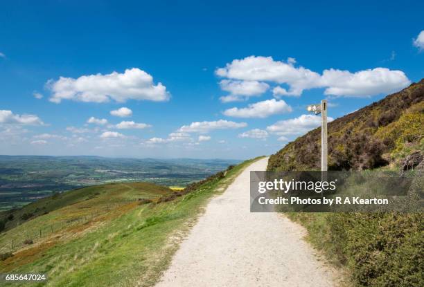 footpath sign at moel famau country park, north wales - flintshire stock pictures, royalty-free photos & images