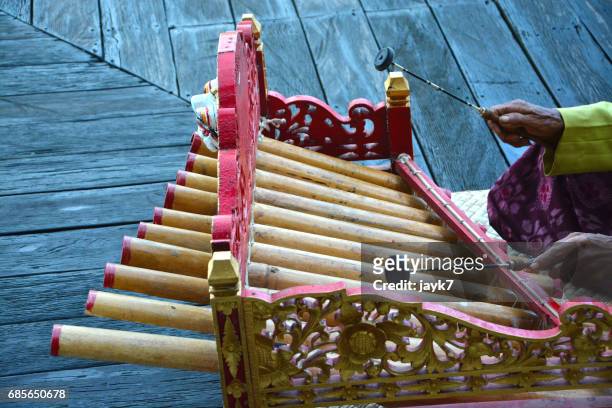 rindik bamboo music instrument - jayk7 bali stock pictures, royalty-free photos & images