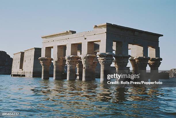December 1968 view of Trajan's Kiosk, part of the temple complex of Philae, located on the island of Philae in the River Nile in Egypt and flooded by...