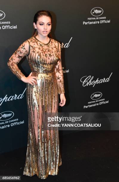 French model and actress Thylane Blondeau poses as she arrives for the Chopard "Space" party on the sidelines of the 70th Cannes film festival, on...