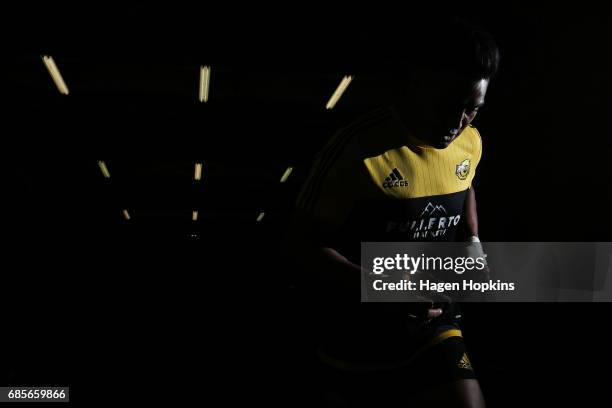 Julian Savea of the Hurricanes takes the field to warm up during the round 13 Super Rugby match between the Hurricanes and the Cheetahs at Westpac...