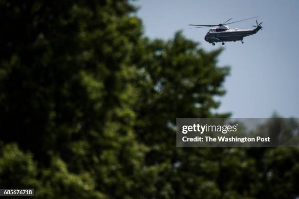 Marine One, with President Donald Trump and first lady Melania Trump aboard, lifts off from the South Lawn for a short trip to Andrews Air Force...